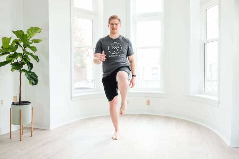 Man doing single leg marching