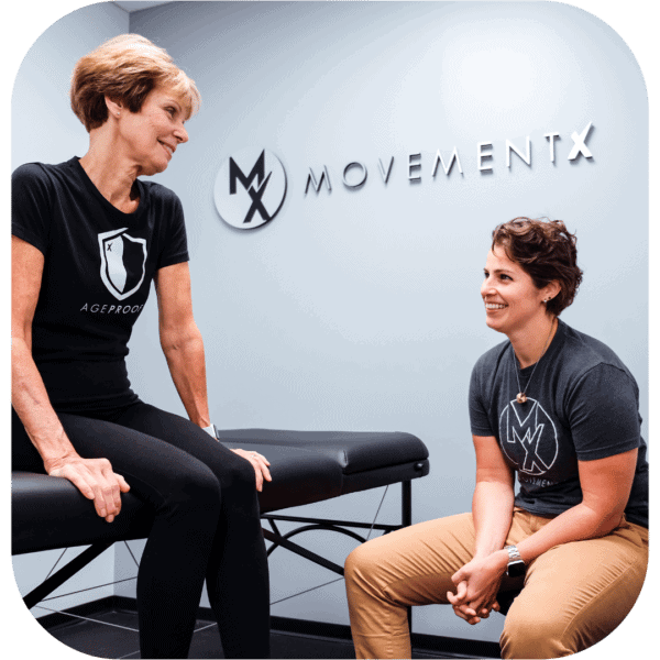 MovementX physical therapist talking with a new patient who was prescribed physical therapy by her physician via a prescription