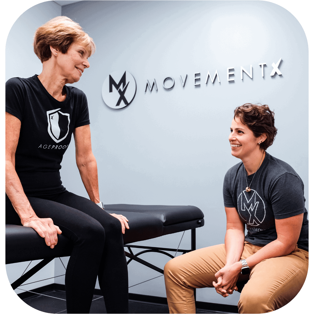 MovementX physical therapist talking with a new patient who was prescribed physical therapy by her physician via a prescription