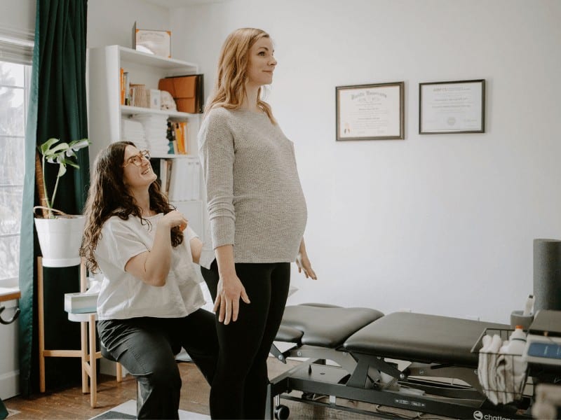 MovementX pelvic health physical therapist Mackenzie Van Loo working with a pregnant woman in Bend Oregon