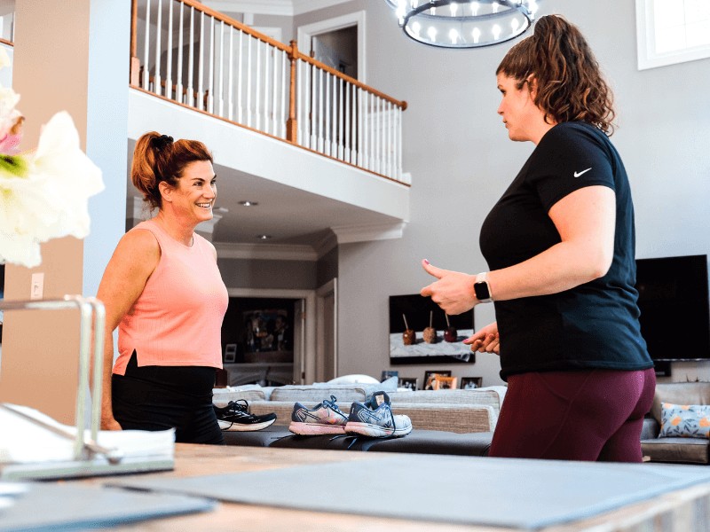 MovementX running specialist meg pezzino performing a complete running assessment in a runner's home in arlington virginia