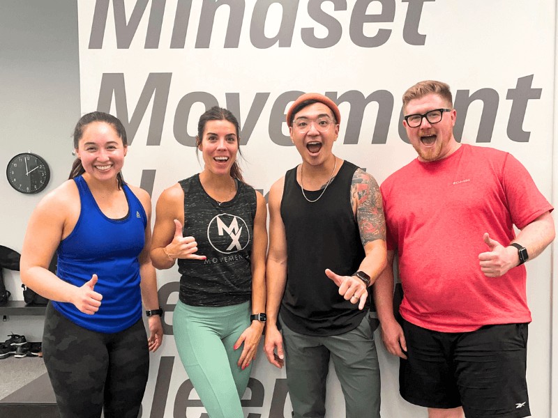 four movementx providers working out together at a gym