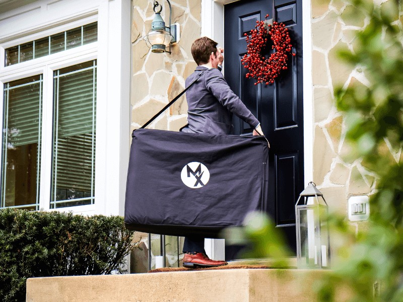 MovementX Provider and CEO, Josh D'Angelo, PT, DPT knocking on the door of a patient at their home.