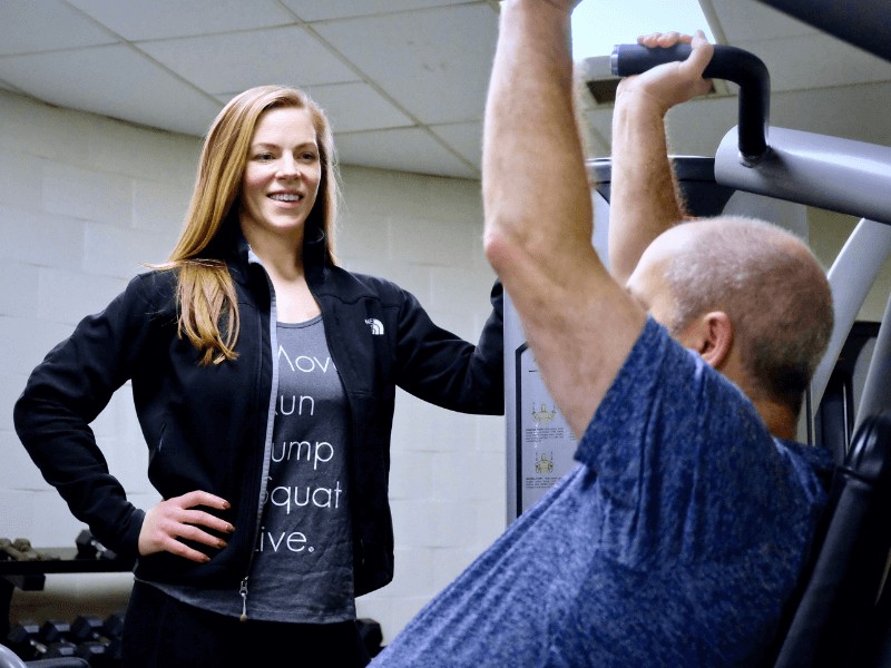 movementx personal trainer in northern virginia working with a male client on shoulder strength