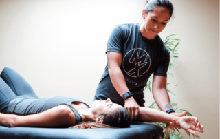 a movementx physical therapist in orange county ca treating a patient with shoulder pain after getting hired in a new PT job position