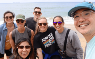 a group of movementx physical therapists enjoying flexible pt careers at the beach