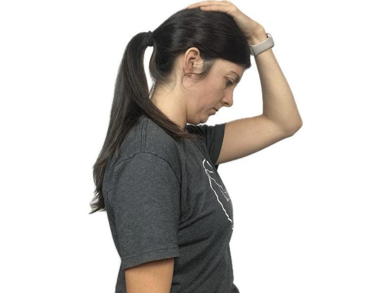 Dr. Lauren Scott demonstrating a Neck Flexion Stretch