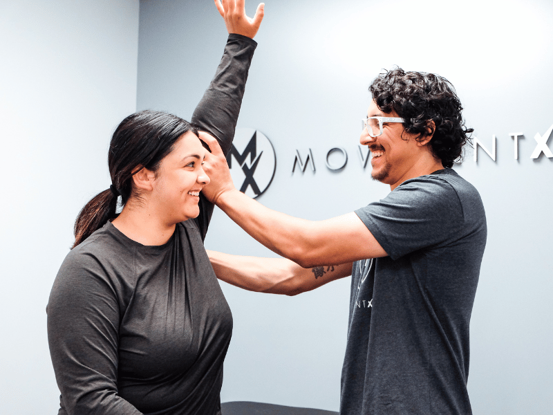 A MovementX physical therapist helping a patient communicate and move better in Washington, D.C.