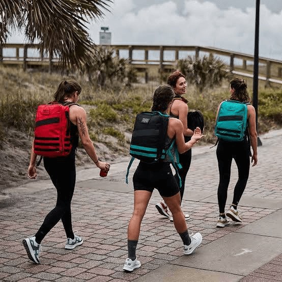 A group of women rucking and talking.