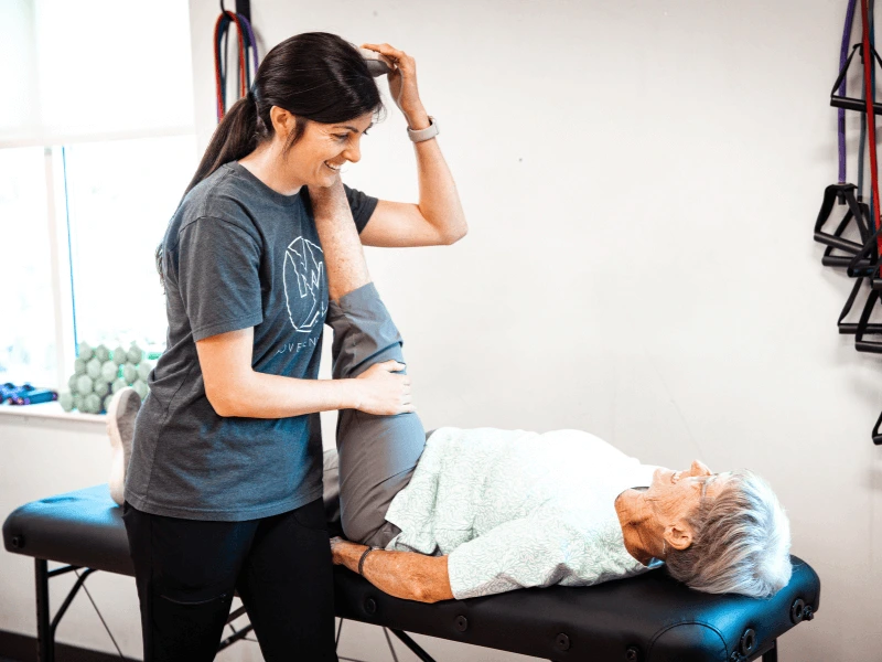 Lauren Scott MovementX Physical therapist in Chattanooga Tennessee helping a senior with hip arthritis pain relief