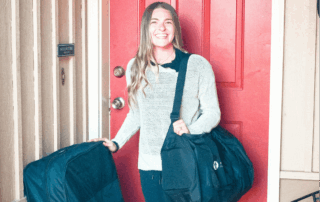 a movementx physical therapist in bend oregon standing at the door of a new patient's home